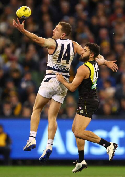 CELEBRATION: Joel Selwood and Shane Edwards, pictured in a previous contest, celebrated their playing milestones with victories. Picture: Scott Barbour/Getty Images