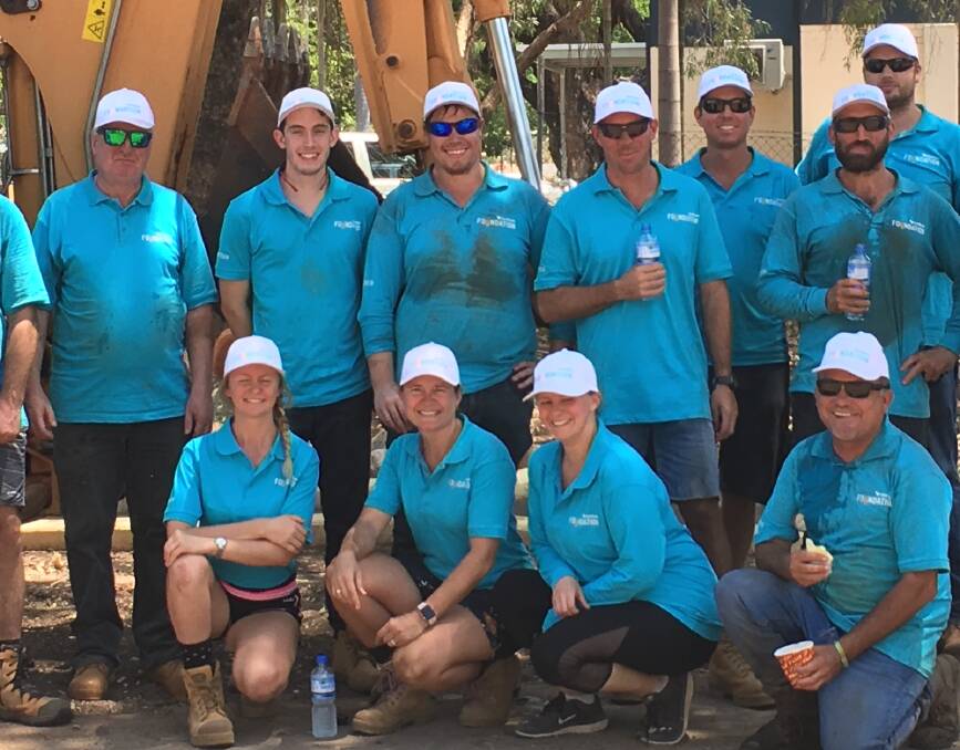 TEAM WORK: Lendlease volunteers help restore the Rotary Family Fun Park to its former glory. Picture: supplied.