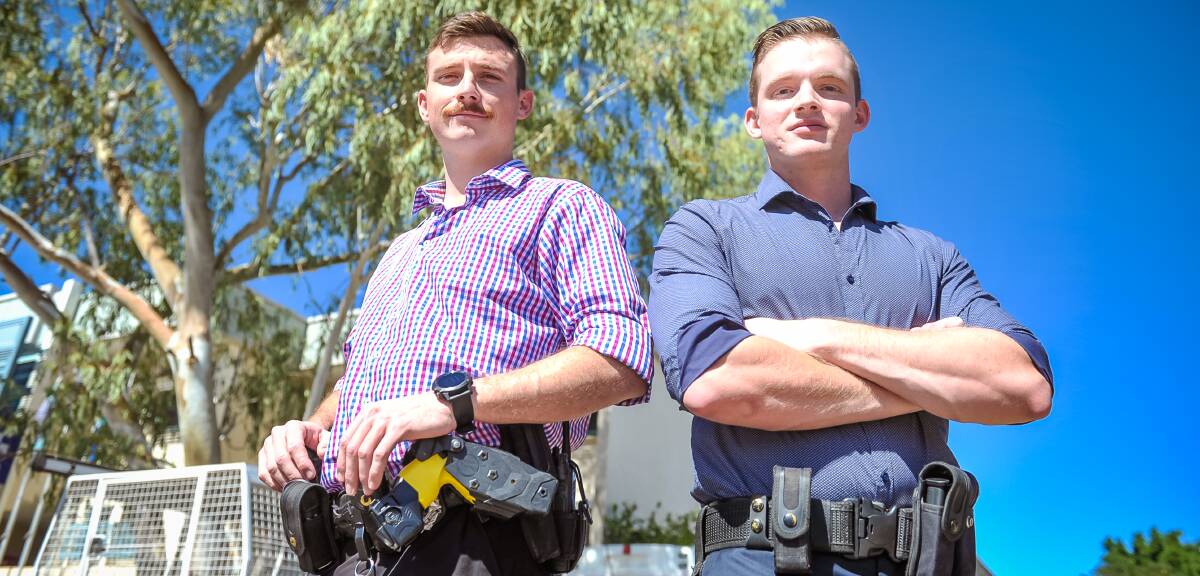 YOUNG GUNS: Constable Fraser Hutson and Constable Jon Conley work as investigators at the Mount Isa Criminal Investigations Branch. Picture: Kelly Butterworth.