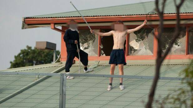 Rioting teens on the roof of Melbourne's Parkville youth detention centre in 2016. Photo: Jesse Marlow