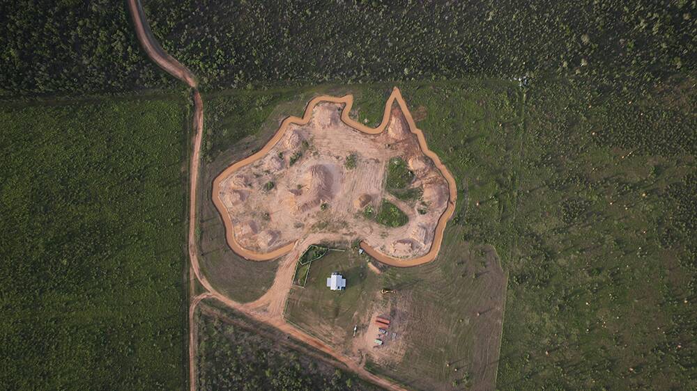 HOME TURF: The outback larrikin loves his country so much, he carved a moat in the shape of Australia around his property.  Picture: supplied 