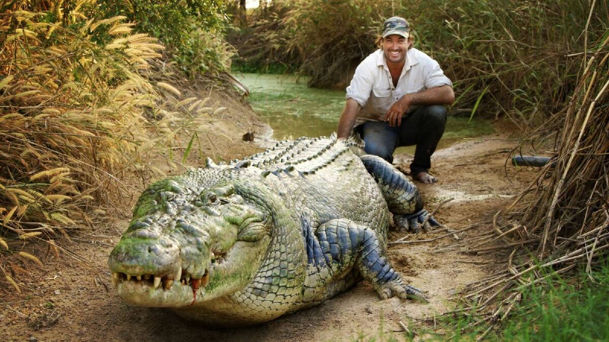 BEST MATES: Matt Wright and his pet crocodile Tripod. Picture: supplied 