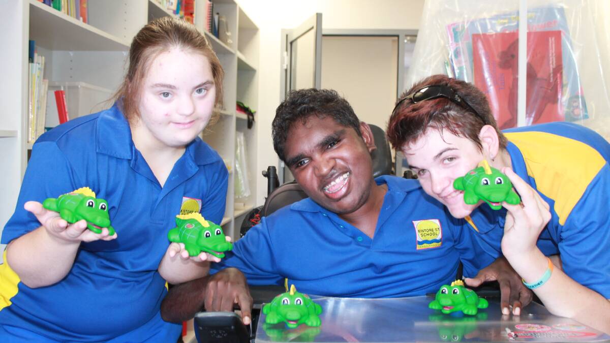 SNAPPED UP: Briony Festing, Ooen-Shi Green and Hollie Henderson with the pint sized crocs.