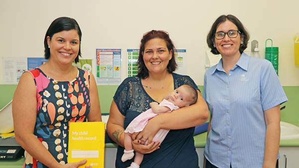 Health minister Natasha Fyles, mum Naomi Harn and her newborn baby Sally and Parap Community Health Clinic nurse Cleo Richardson. Picture: NT Govt. 